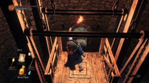 Een screenshot uit Dark Souls 3, waar een speler een lift gebruikt als één van de vele shortcuts