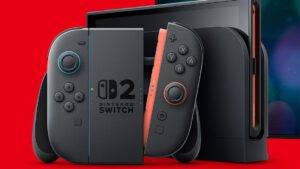 De Switch 2 in dock, met daarvoor de Joy-Cons in een houder