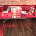 Een stapel Catanspellen voor de NK Catan qualifier in Rotterdam