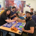 Kogul en ik schudden elkaar de hand voor ons potje Altered op DAC II